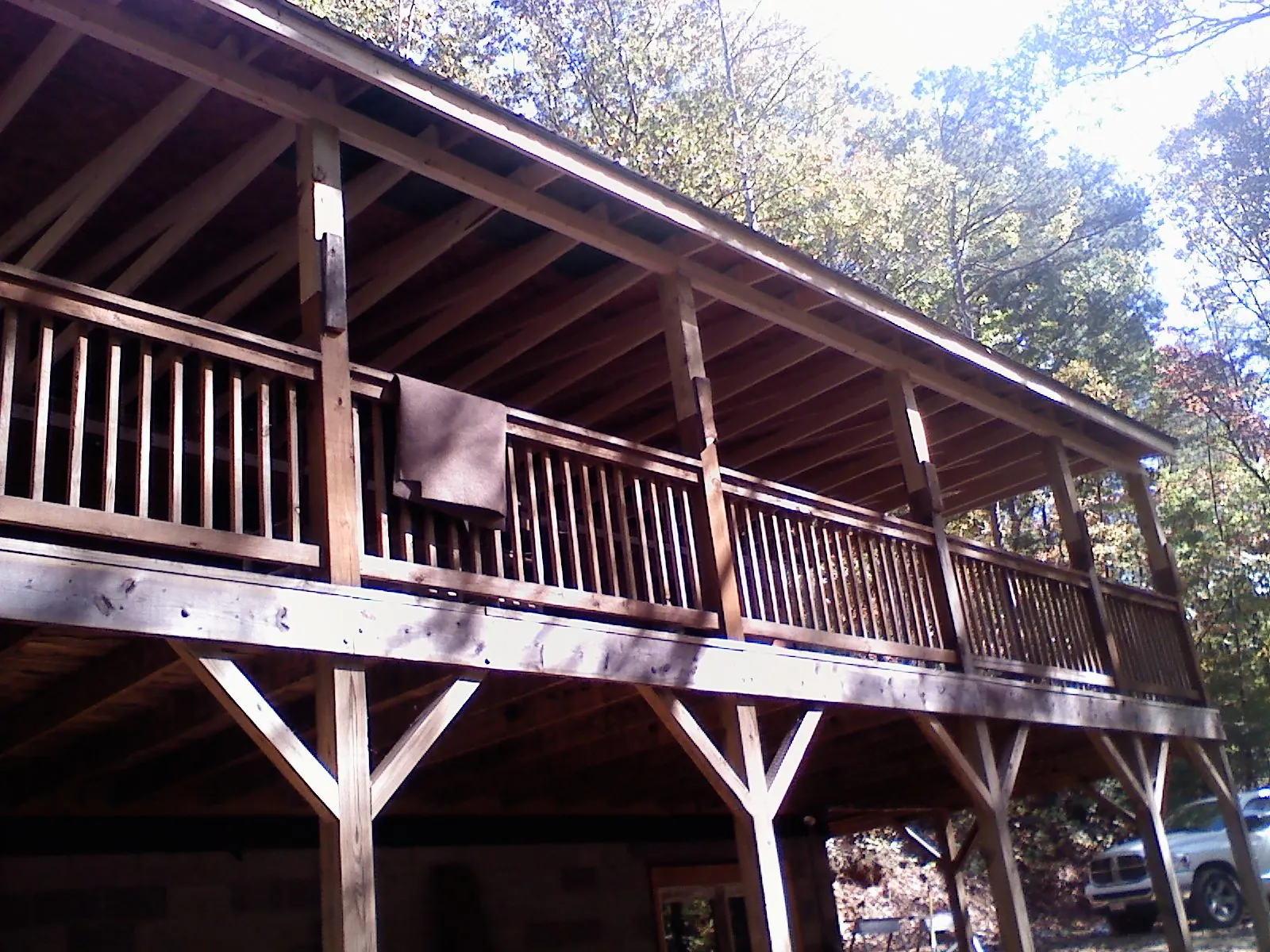 Timber framing under a new elevated porch and deck — Roof Leak Repair in Mill Creek by Roofing Brothers